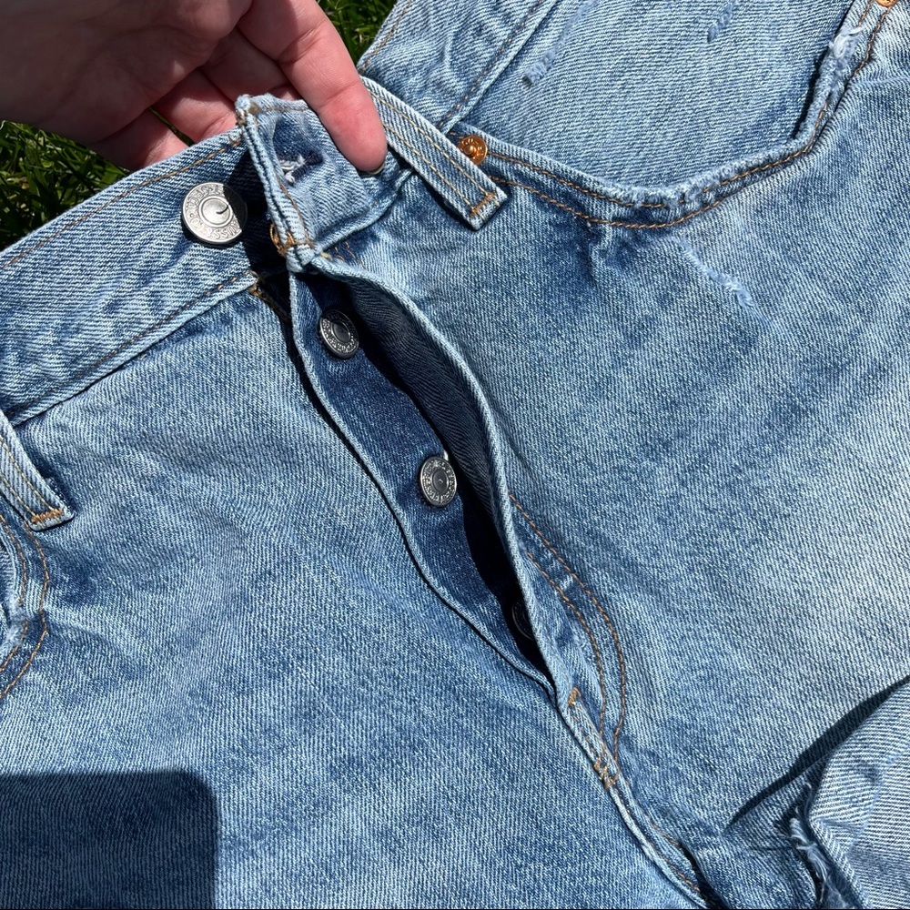 Levi Distressed Buttonfly Cutoffs - image 3